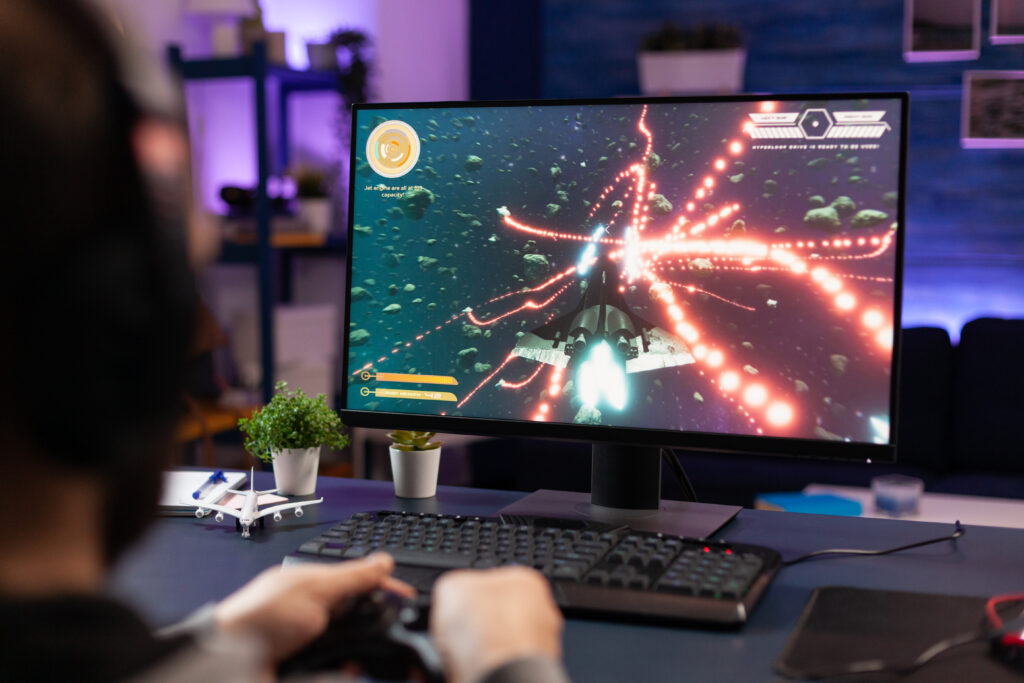 adult-playing-video-games-at-home-in-evening-2026-03-19-01-58-45-utc
