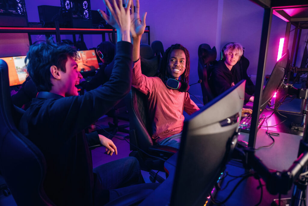 excited-gamers-high-five-while-playing-online-game-2026-03-25-09-19-33-utc