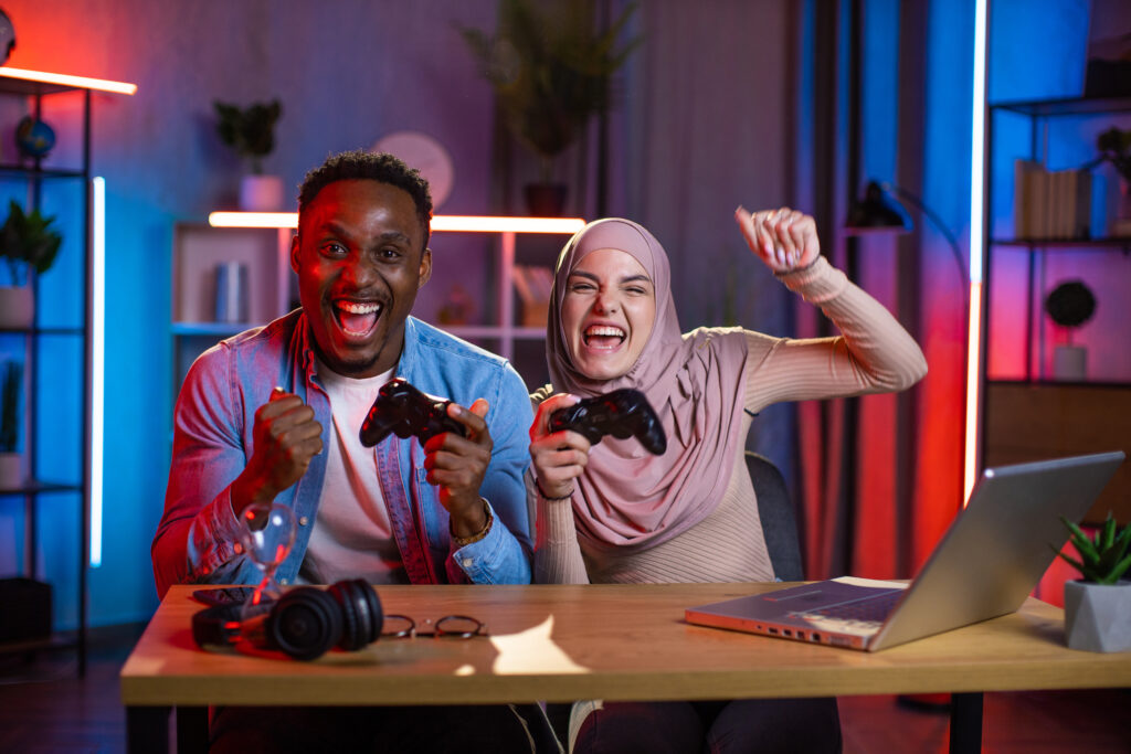 excited-young-adults-playing-video-game-at-home-2026-03-16-02-47-18-utc