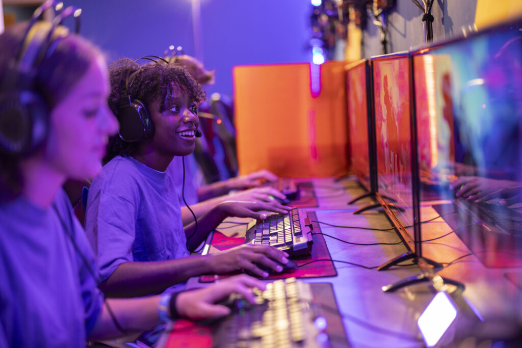young-adults-playing-video-games-at-gaming-center-2026-03-19-08-11-05-utc
